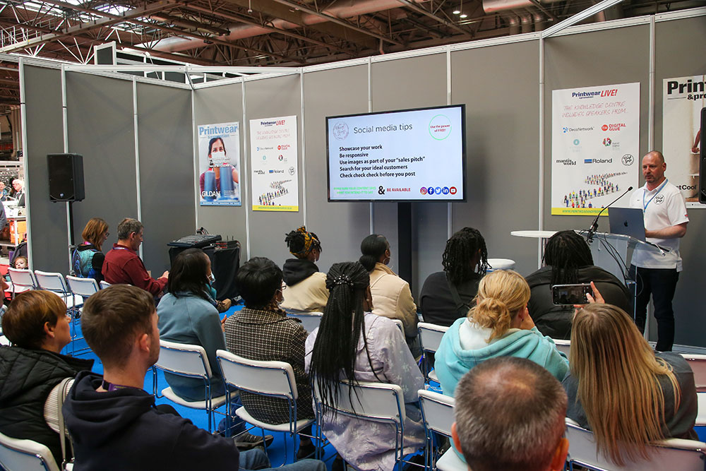 Speaker leading a session at Printwear & Promotion Live