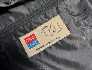 Close up of a Circular Textile Foundation label on a David Luke blazer