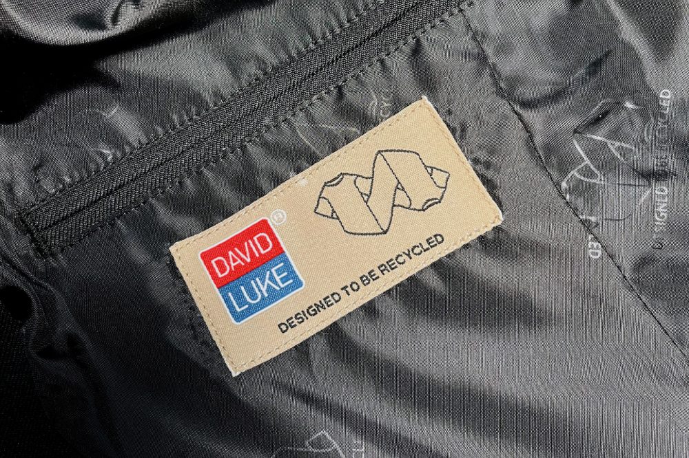 Close up of a Circular Textile Foundation label on a David Luke blazer