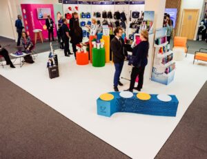 People stood on a stand at The Schoolwear Show