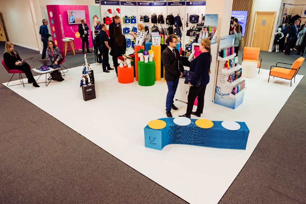 People stood on a stand at The Schoolwear Show