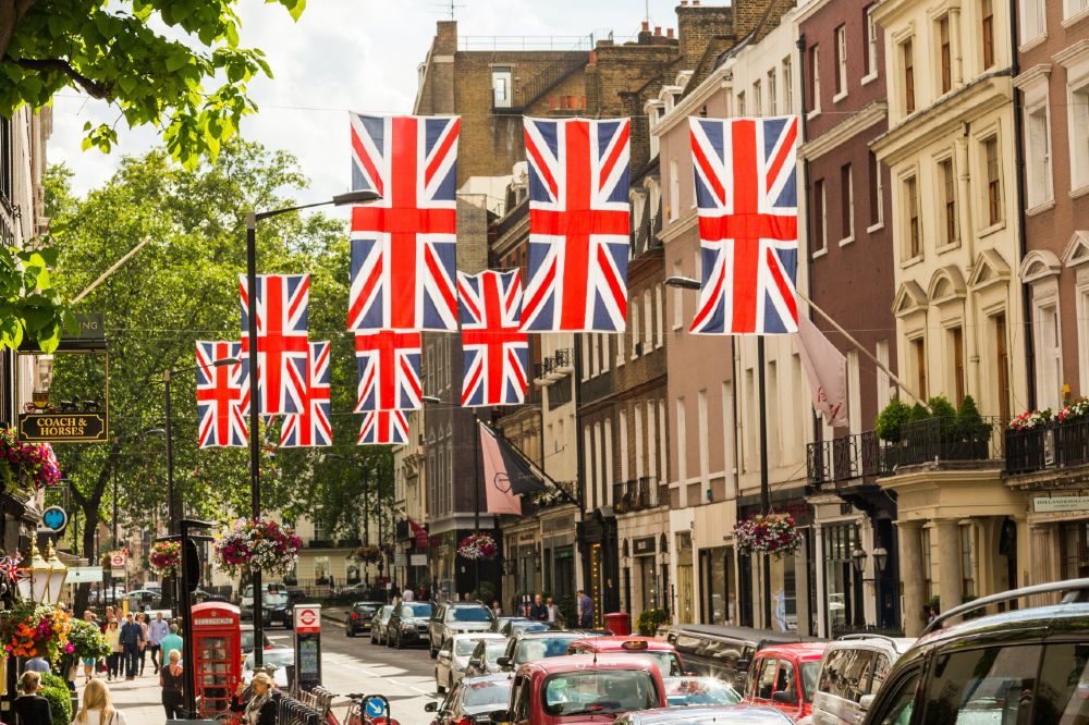 A high street decorated with Union Jack flags to celebrate the King's Coronation