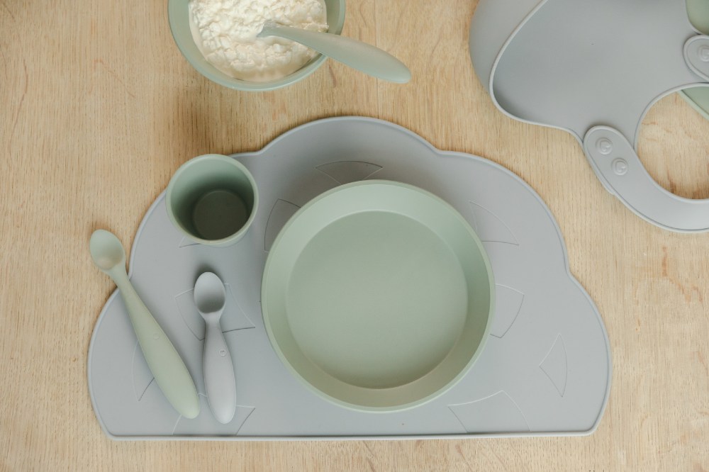 Children's blue dinner set on a table from the BIBS mealtime range