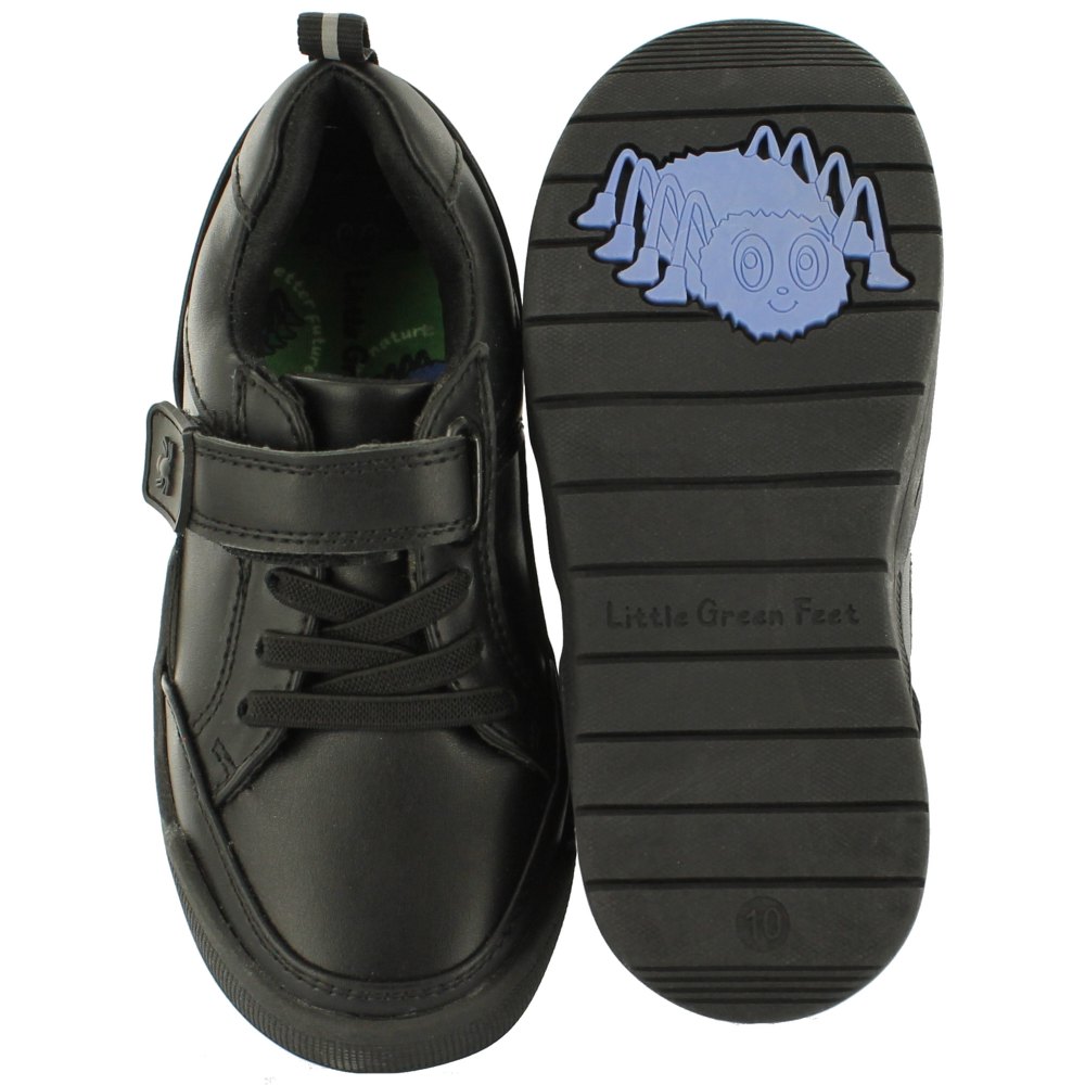 A pair of black school shoes with a blue spider on the sole by Little Green Feet 