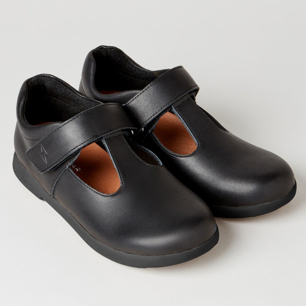 A pair of black school shoes by Zig + Star 