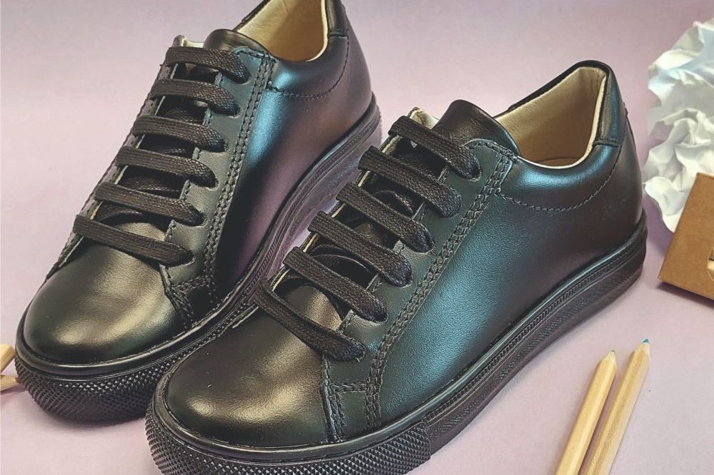 Pair of black lace-up school shoes by Froddo