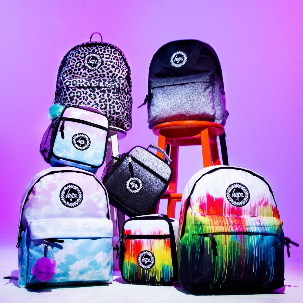 A selection of backpacks by Hype displayed on a purple background