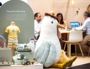 A display of children's accessories and toys on a stand at Kind + Jugend 2023