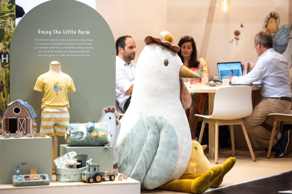 A display of children's accessories and toys on a stand at Kind + Jugend 2023