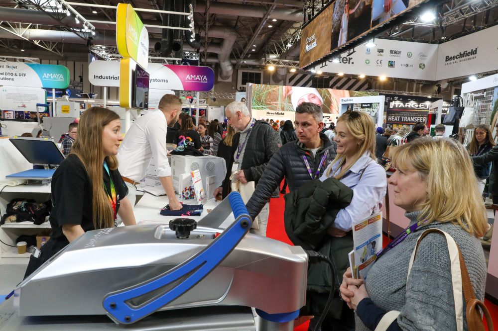 People on a stand at the Printwear & Promotion LIVE! trade show