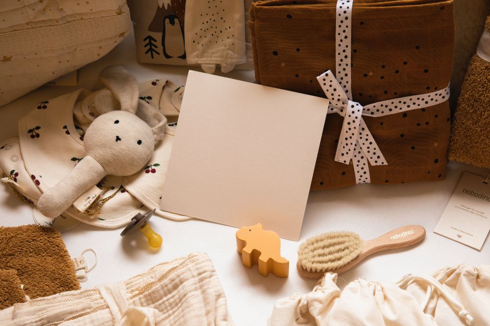 A selection of baby's clothes, accessories and gifts