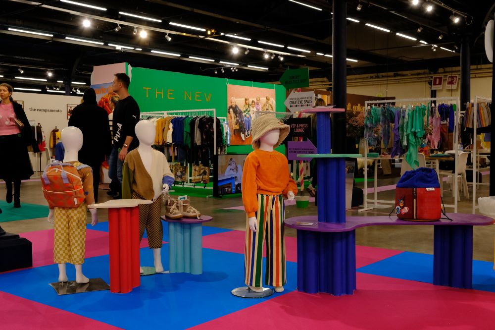 Mannequins displaying children's fashion at Playtime Paris 