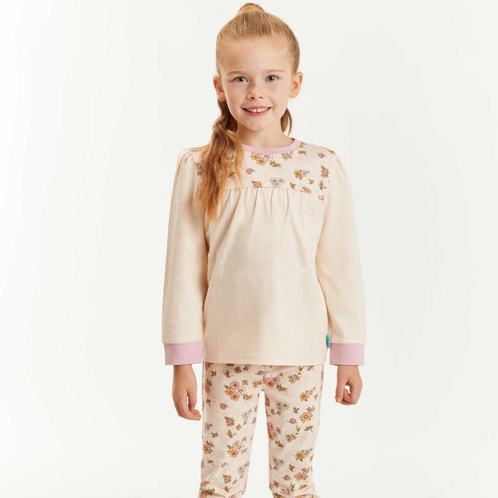 A girl wearing pyjamas by Luca and Rosa 