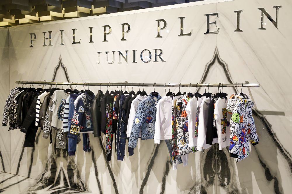 The Philipp Plein Junior collection displayed on a rail at Pitti Bimbo 