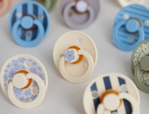 Different coloured baby pacifiers by BIBS