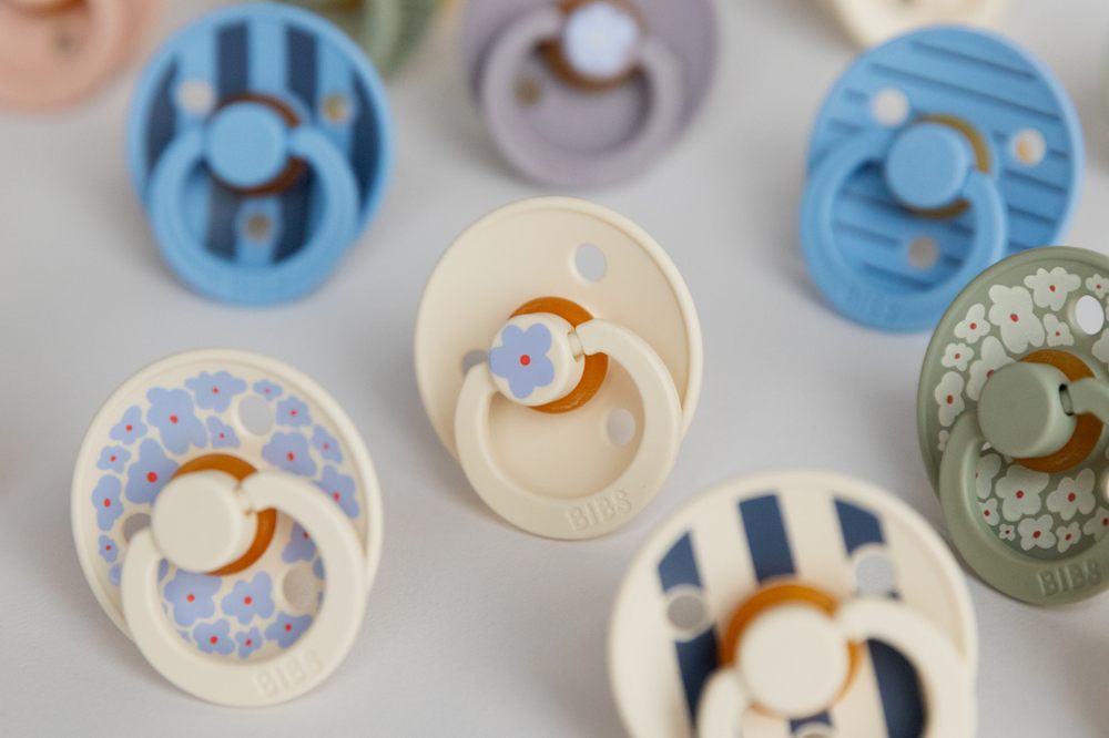 Different coloured baby pacifiers by BIBS