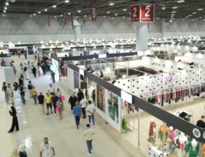A busy exhibition hall full of visitors at the Istanbul Expo Center