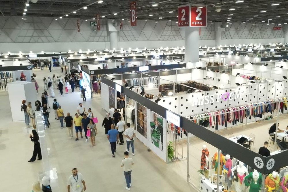 A busy exhibition hall full of visitors at the Istanbul Expo Center