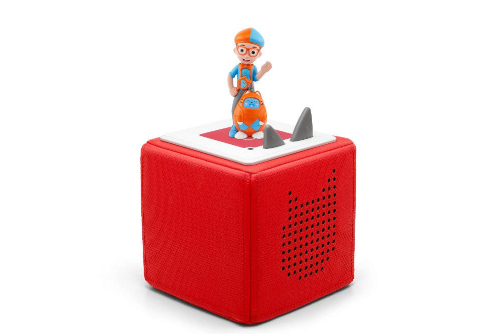 A Blippi character stood on top of a red Toniebox