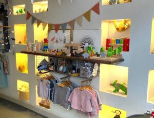 The interior of Buttercup children's shop showing children's clothes and toys