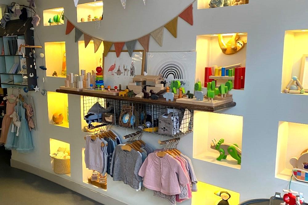 The interior of Buttercup children's shop showing children's clothes and toys