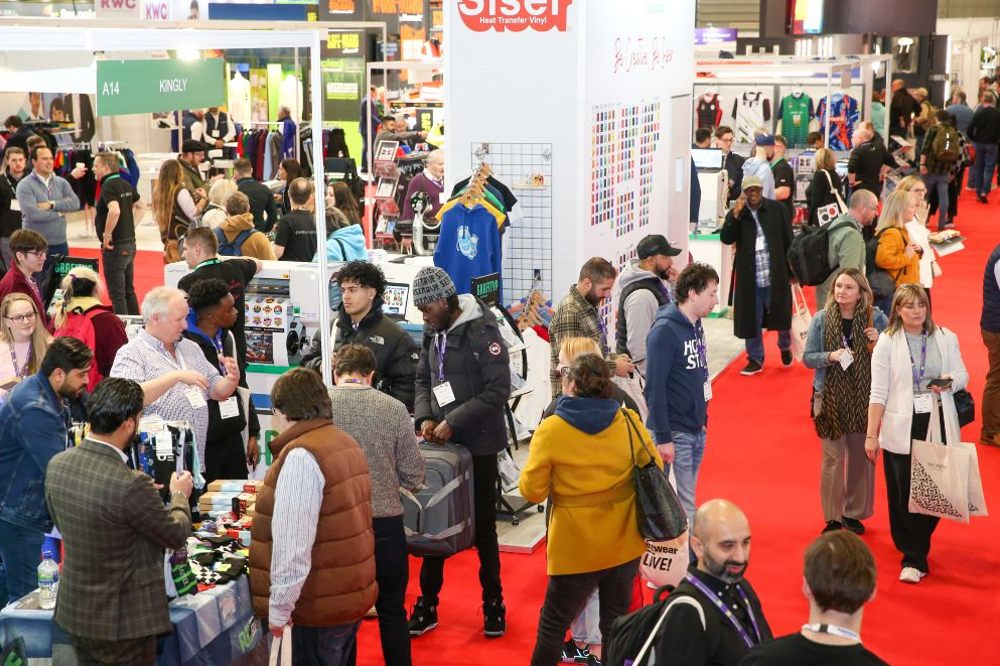 A busy hall full of people at the Printwear & Promotion LIVE! trade show