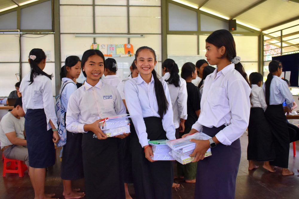 A group of children in school uniform in a classroom in Cambodia 