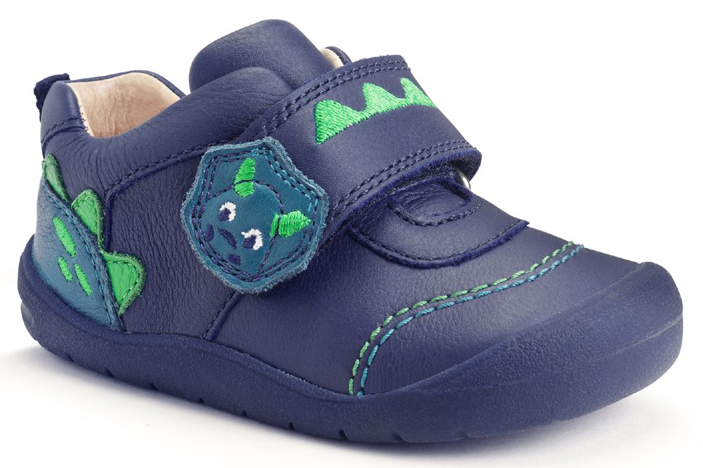 A child's blue shoe with a dinosaur motif 