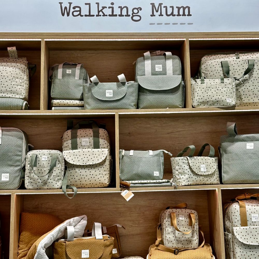 A display of bags on shelves at Babykid Spain + FIMI 