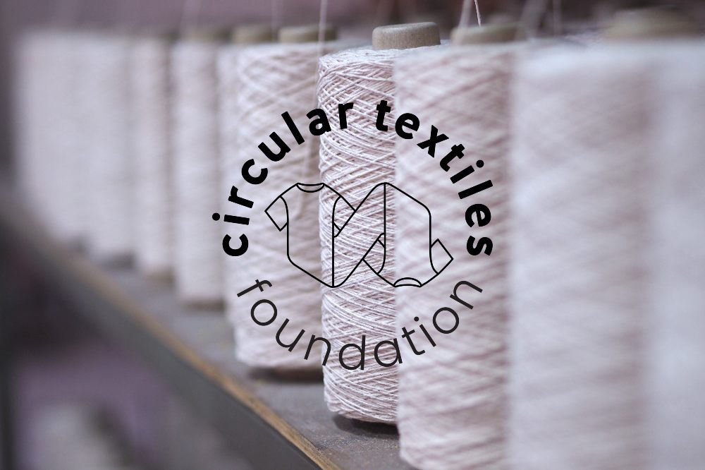 Circular Textiles Foundation logo over cotton reels 