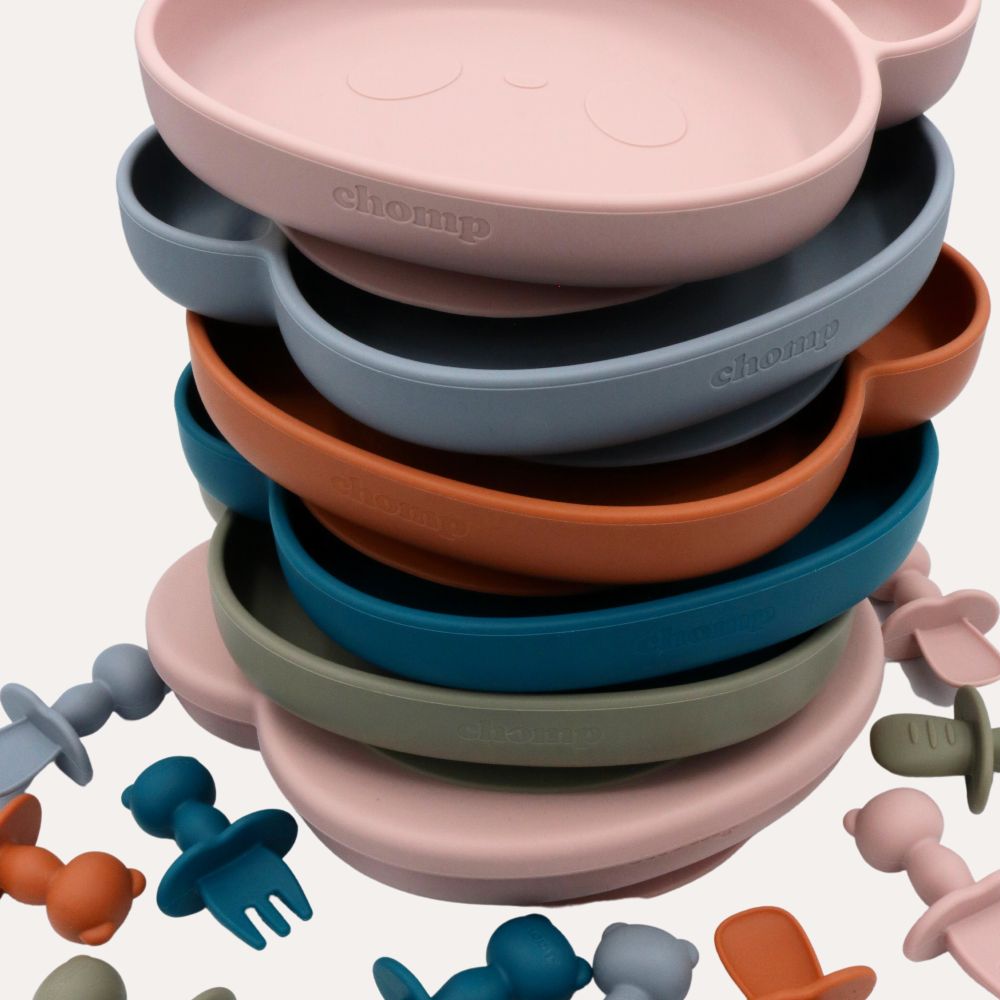 A stack of panda face shaped children's bowls and cutlery 