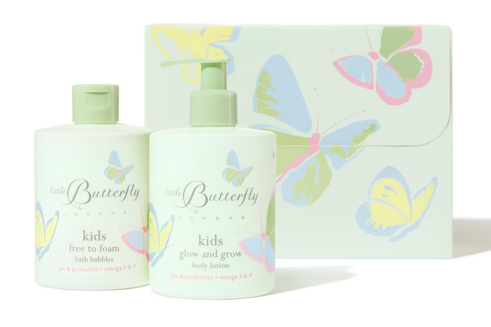 Children's skincare products beside a gift box 