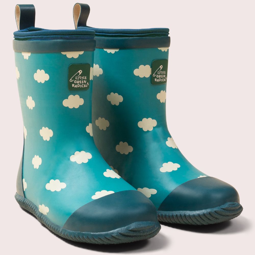 A pair of blue children's rubber boots with a white cloud print 