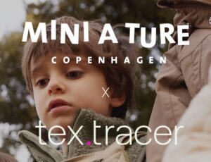 Mini A Ture and Tex,tracer text across an image of a young child outside wearing a coat