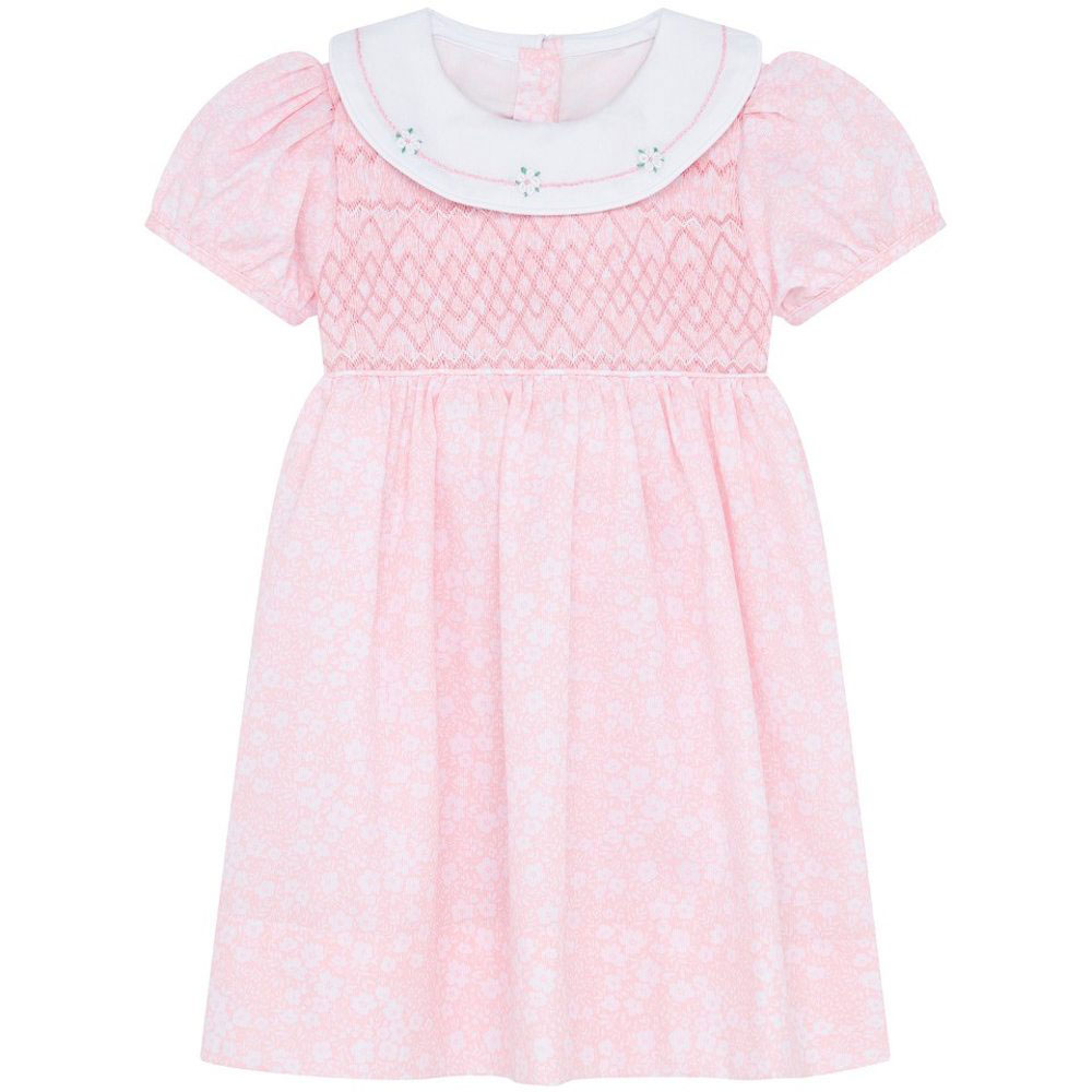 A girl's short-sleeved pink dress with a flower pattern