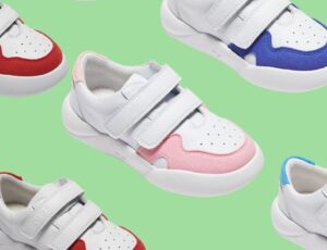 Children's trainers by Dubs displayed on a pale green background