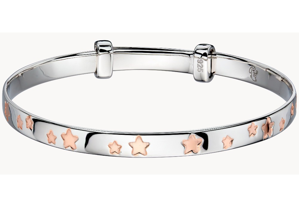 A child's silver bangle inlaid with rose gold stars 