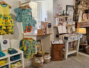 Children's clothes and gifts displayed inside the No. 31 shop