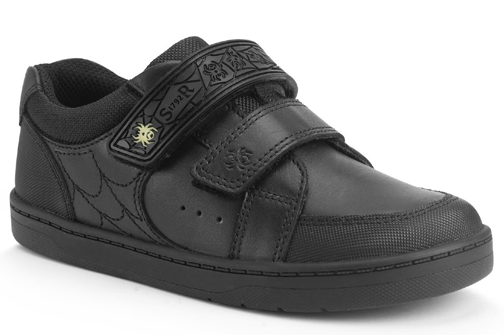 A child's black school shoe with a spider web design by Start-Rite 