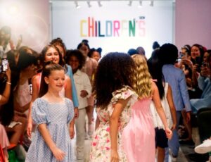 Children on a kids' fashion catwalk at Children's Show