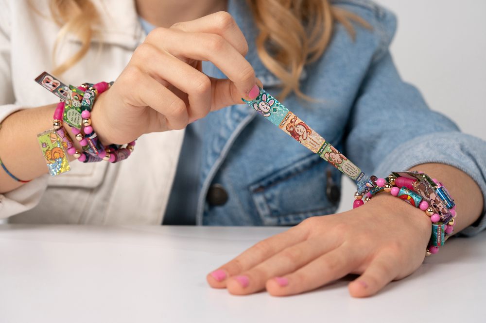 A child making a bracelet 