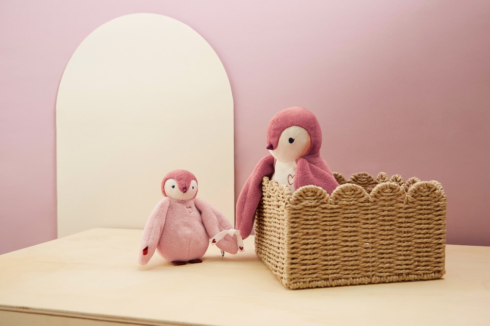 Two pink penguin soft toys