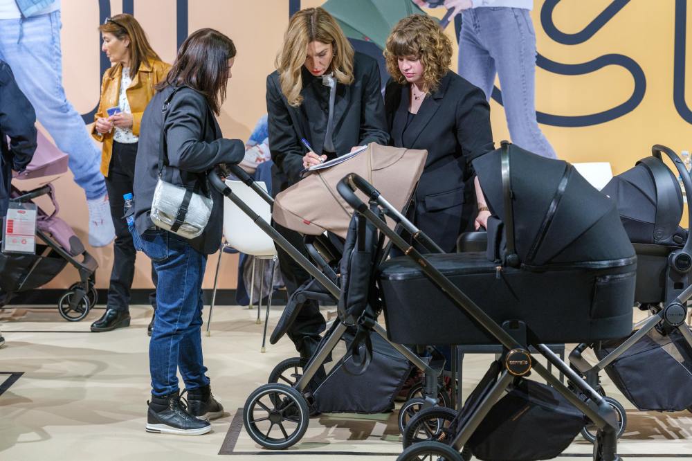 People looking at prams at Babykid Spain + FIMI