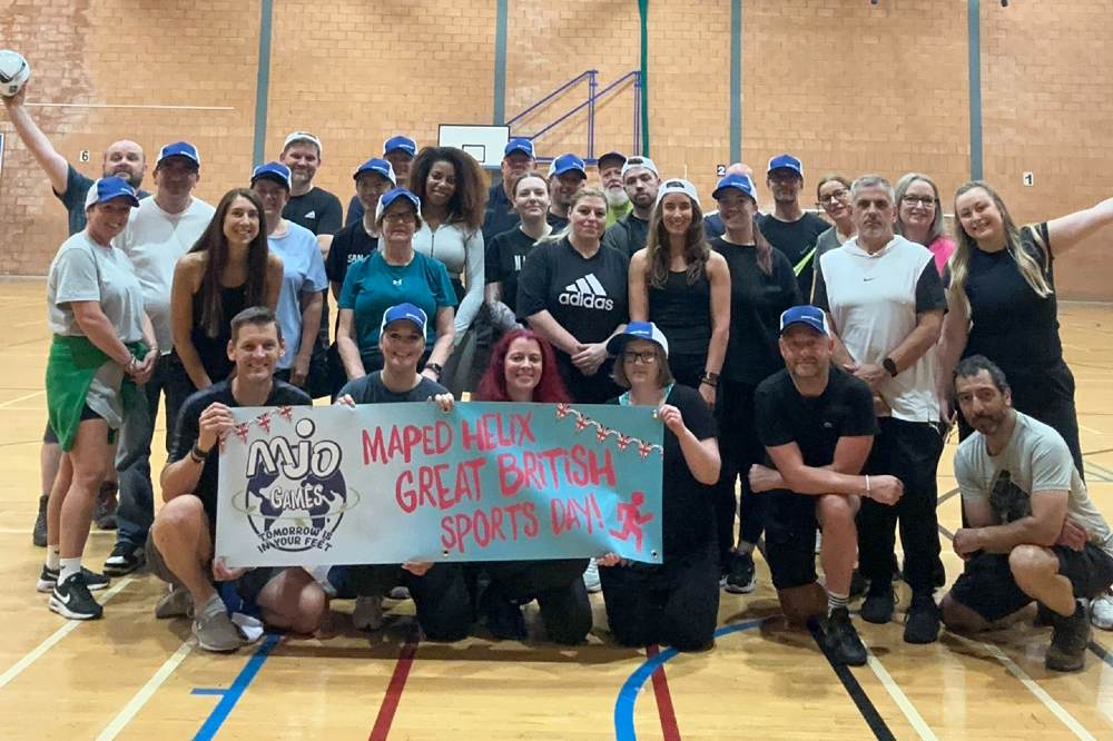 The Maped team in a sports hall celebrating the Maped Helix Great British Sports Day