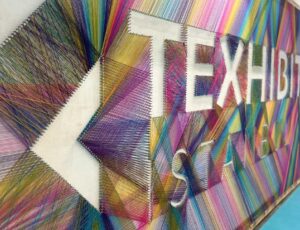 Texhibition Istanbul sign made out of different coloured yarns