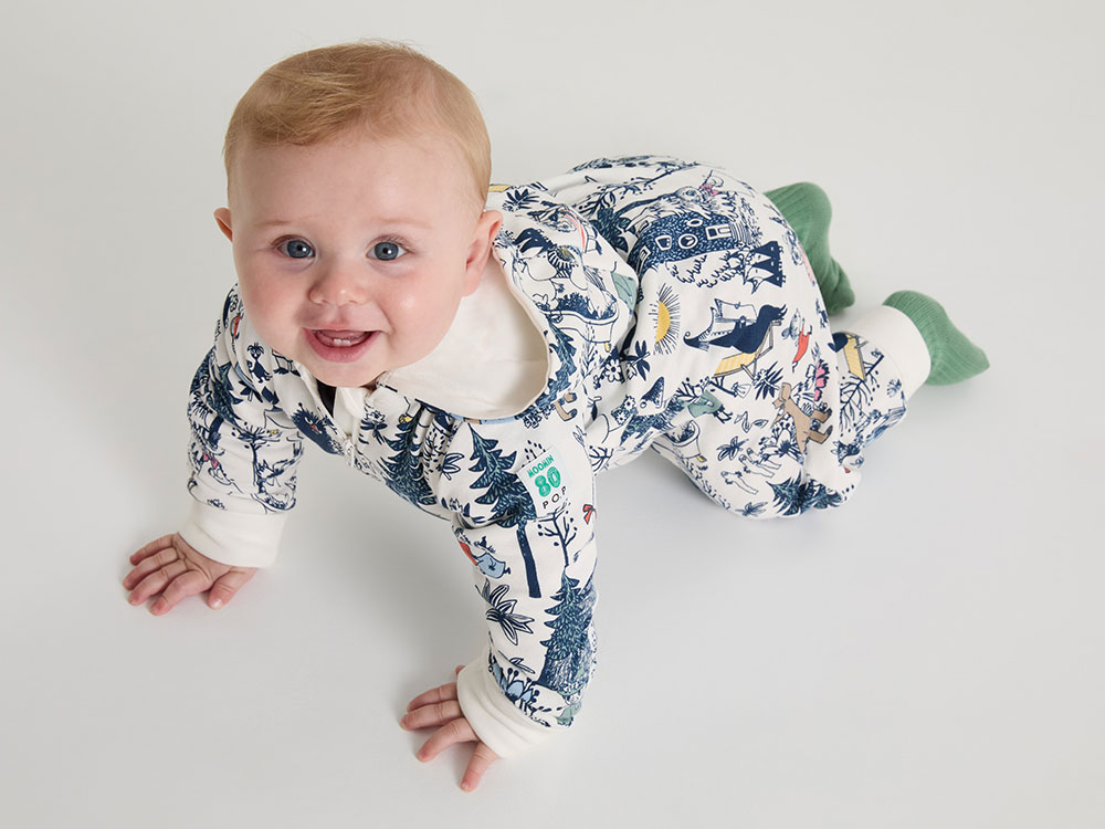 A young baby crawling on the floor