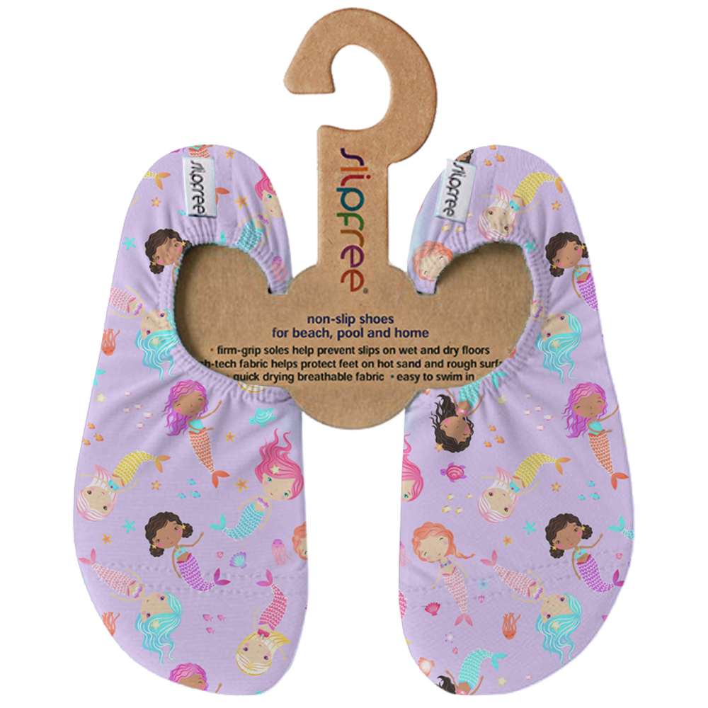 A pair of child's Slipfree shoes on a cardboard hanger 