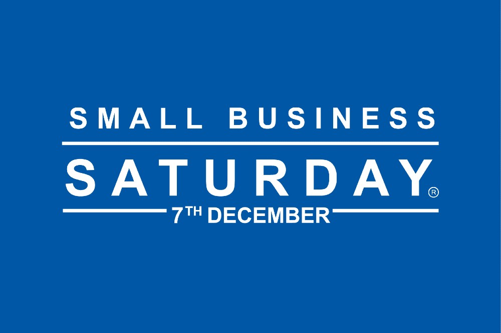 The Small Business Saturday logo on a blue background