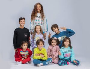 A group of children wearing clothing made by an Egyptian manufacturer