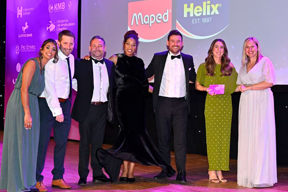 The Maped Helix team on stage receiving their award